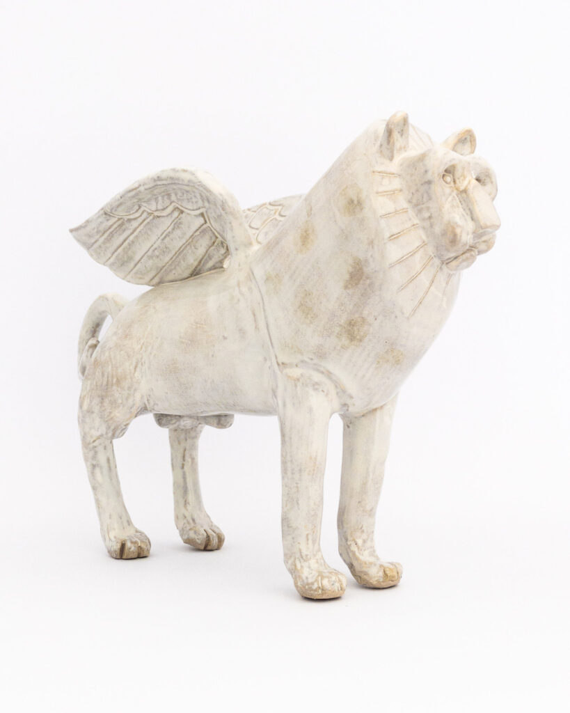Winged ceramic lion in white glaze 