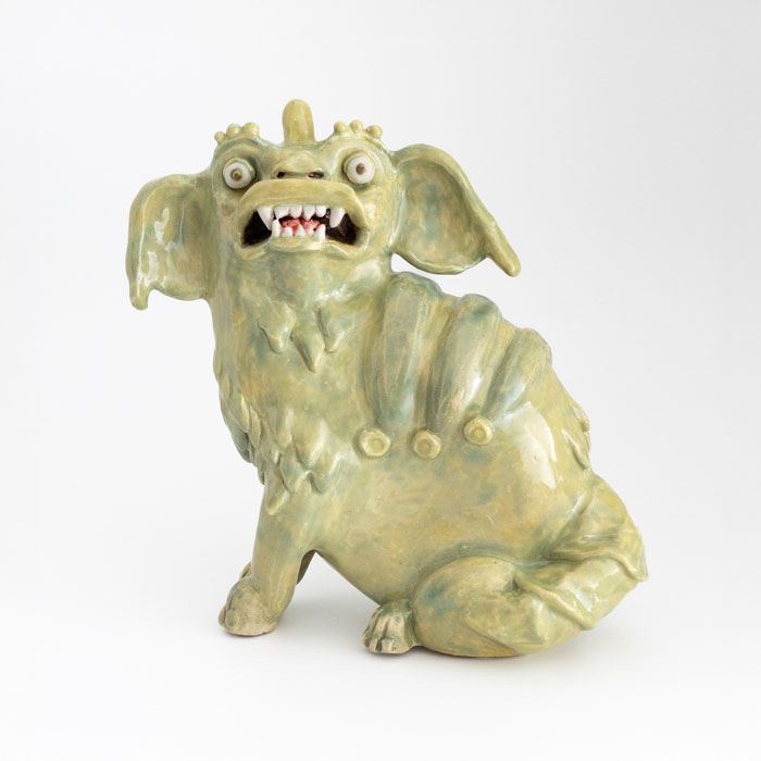Ceramic sculpture based on Chinese-style dogs or lions in the Brighton pavilion, with green glaze