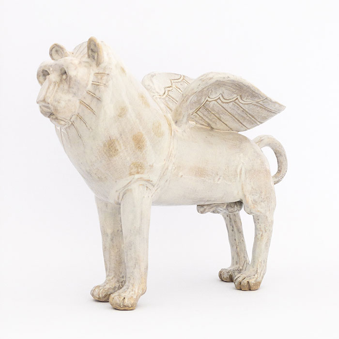 Winged ceramic lion in white glaze 