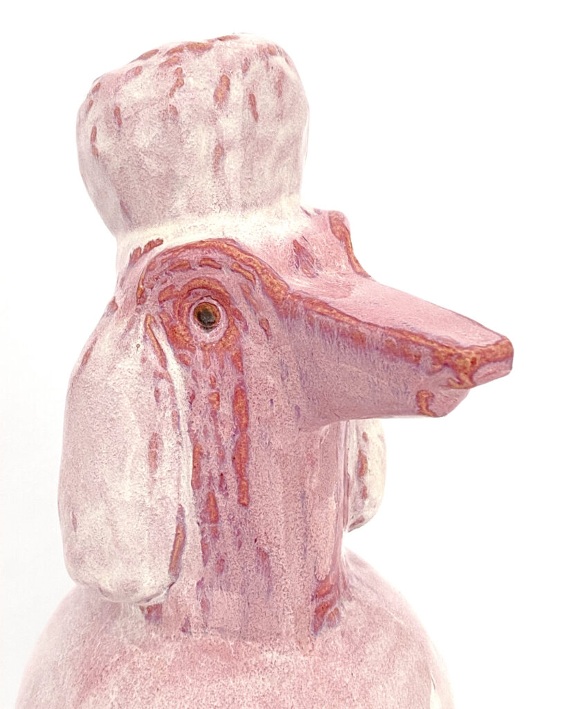 Poodle in melty purple glaze, detail of the face