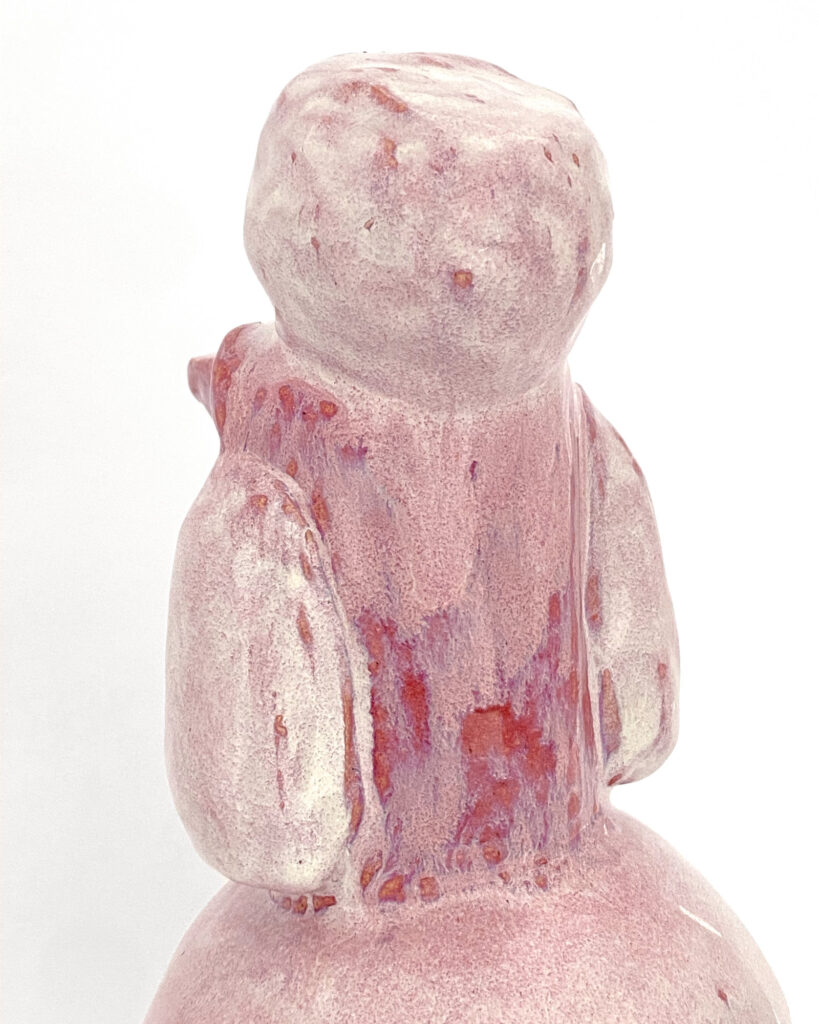 Poodle in melty purple glaze, detail of the back of the head 